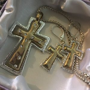 Stained sliver cross outline with a gold cross